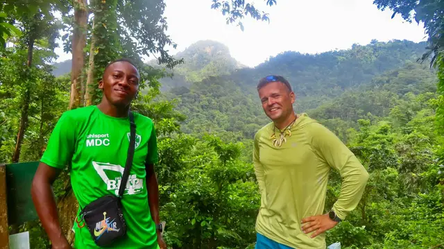 Local guide with a guest in the mountains